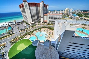 Outdoor pool, a heated pool - Pirate Theme 2nd floor1Bedroom+bunks  Highchair.Crib, Beach chairs, and Towels  (Panama City Beach)