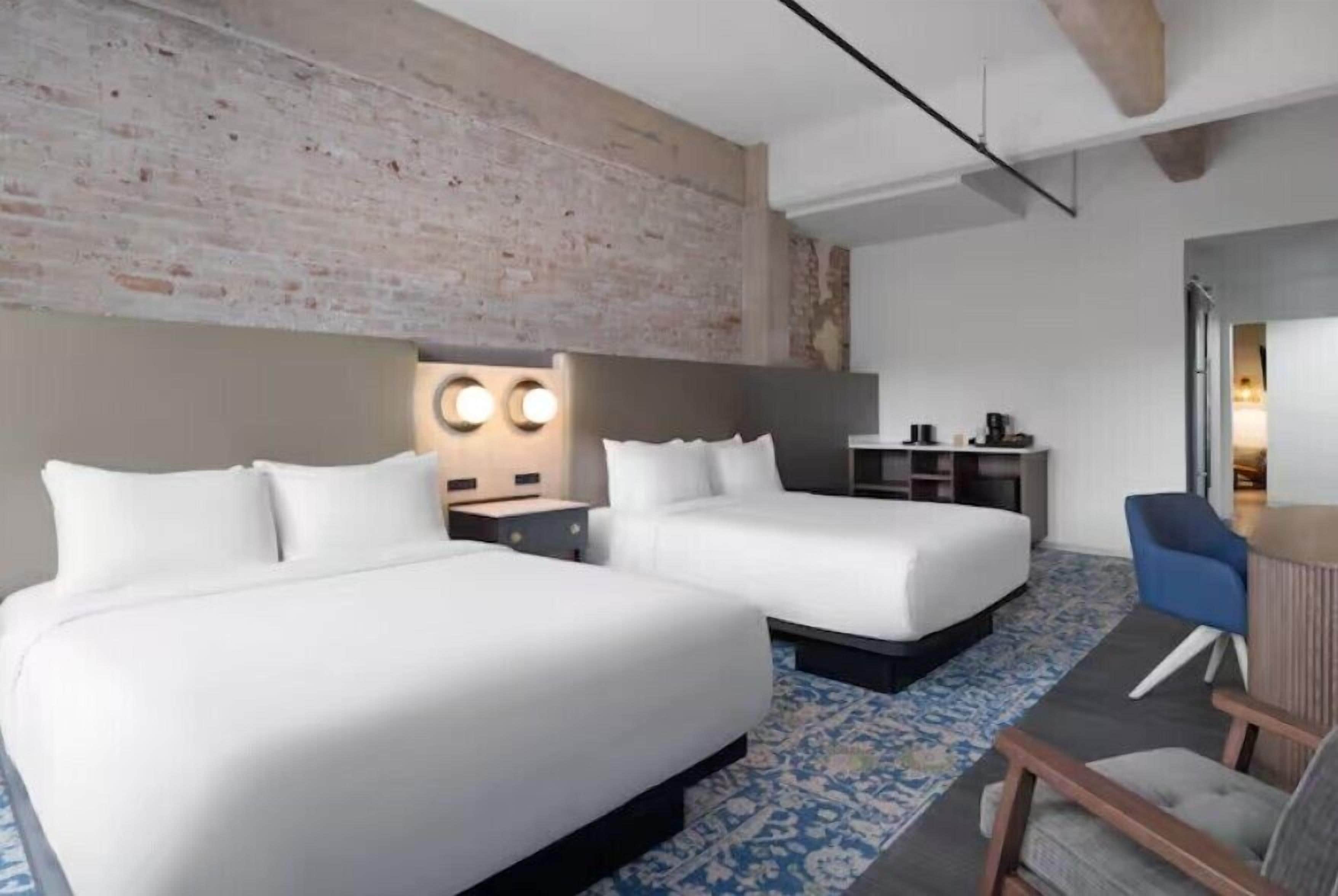 Hypo-allergenic bedding available, in-room safe, desk, laptop workspace