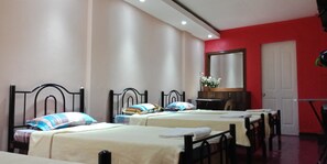 Family Room, 4 Bedrooms | Desk, free WiFi, bed sheets - Casa Sarmiento Travelers Inn (Laoag)