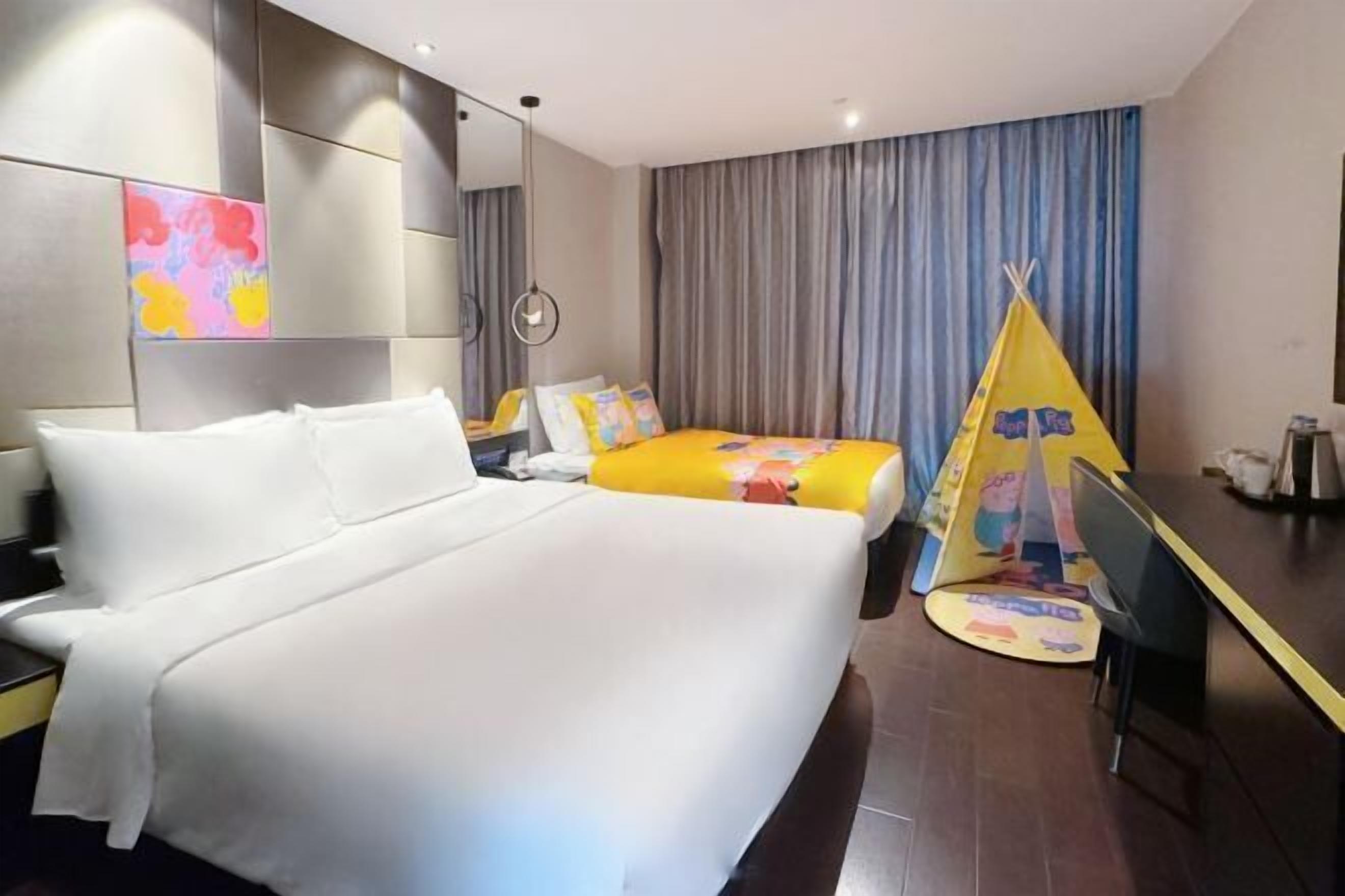 Minibar, desk, blackout drapes, iron/ironing board