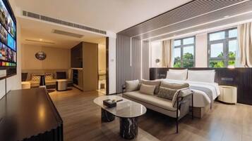 Minibar, desk, blackout curtains, iron/ironing board