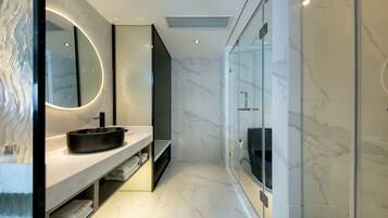 Shower, free toiletries, hair dryer, slippers