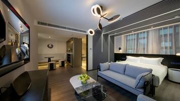 Minibar, desk, blackout curtains, iron/ironing board