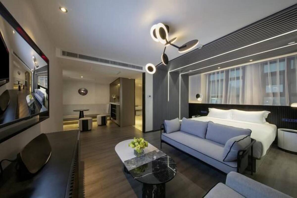 Minibar, desk, blackout curtains, iron/ironing board