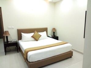 Standard Room | Down comforters, individually decorated, individually furnished, desk - Kumail's Continental Hotel (Lahore)