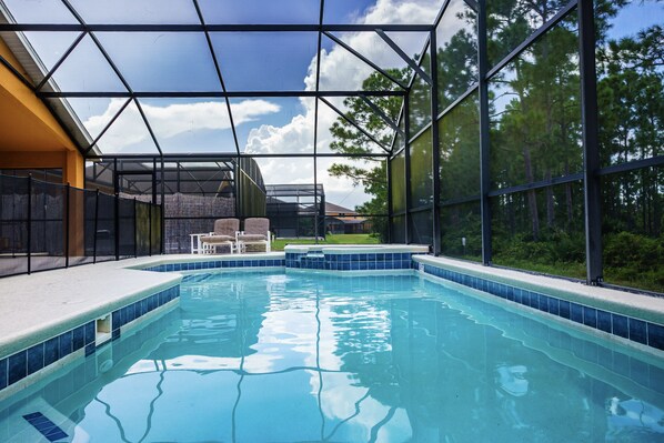 Outdoor pool, a heated pool - Gatted community 4 bed villa with lots of extras. Lots of room for the family (Davenport)