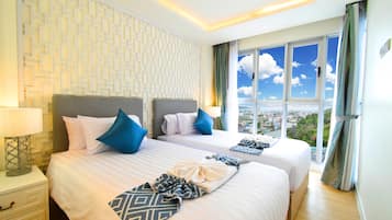 1 Bedroom Suite Sea View | Frigobar, cofres nos quartos, escrivaninha, cortinas blackout