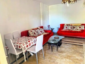 Classic-Apartment | Wohnbereich | Fernseher