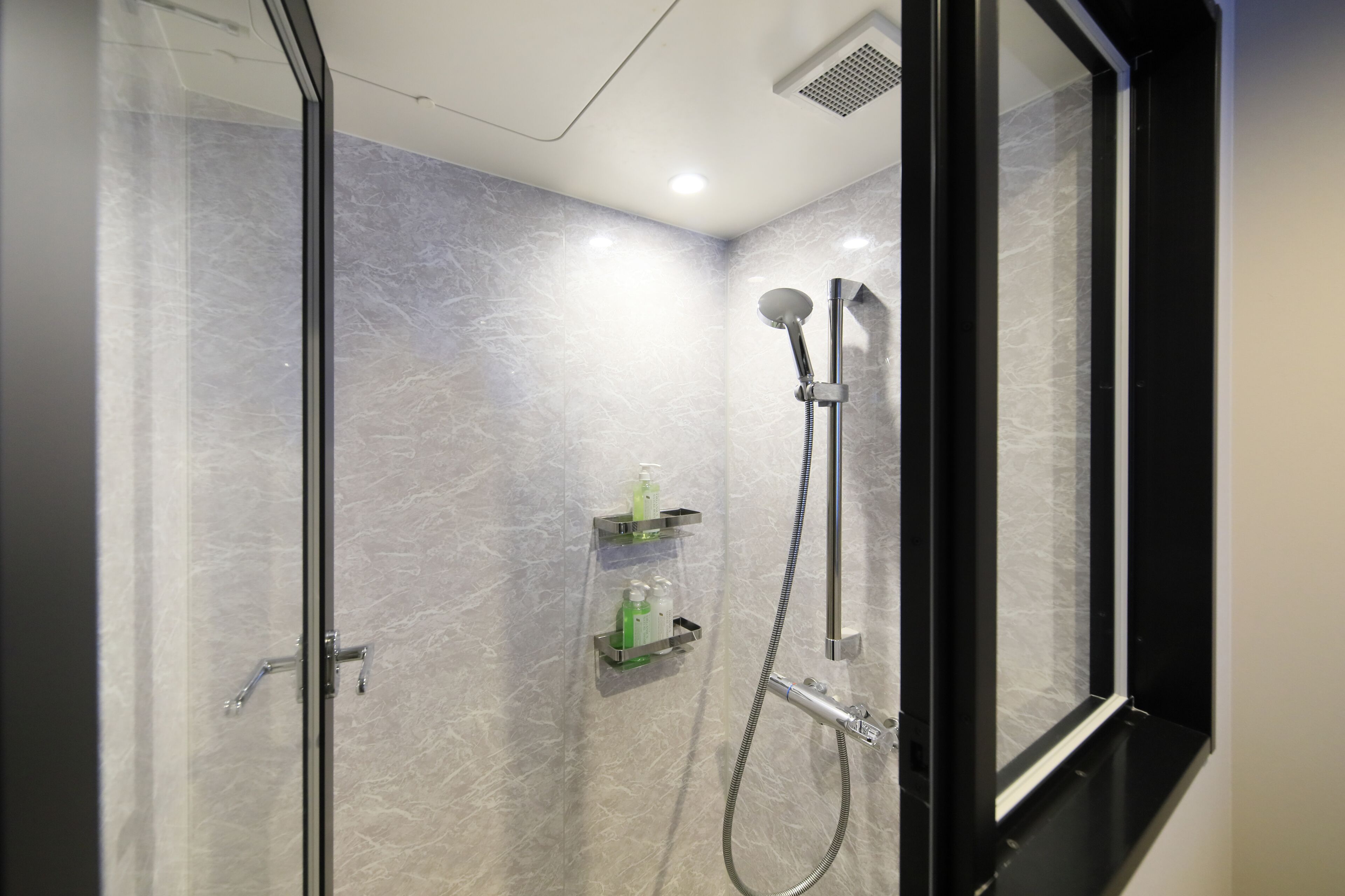 standard queen room | bathroom | free toiletries, hair dryer, slippers, electronic bidet