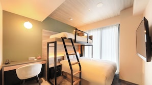 A hotel room with a bunk bed, a desk, a chair, a TV, and a window with curtains. - Quintessa Hotel Fukuoka Hakata Relax&Sleep (Fukuoka)