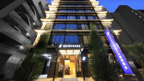A modern hotel entrance with a prominent sign, glass doors, and a well-lit facade. - Quintessa Hotel Fukuoka Hakata Relax&Sleep (Fukuoka)
