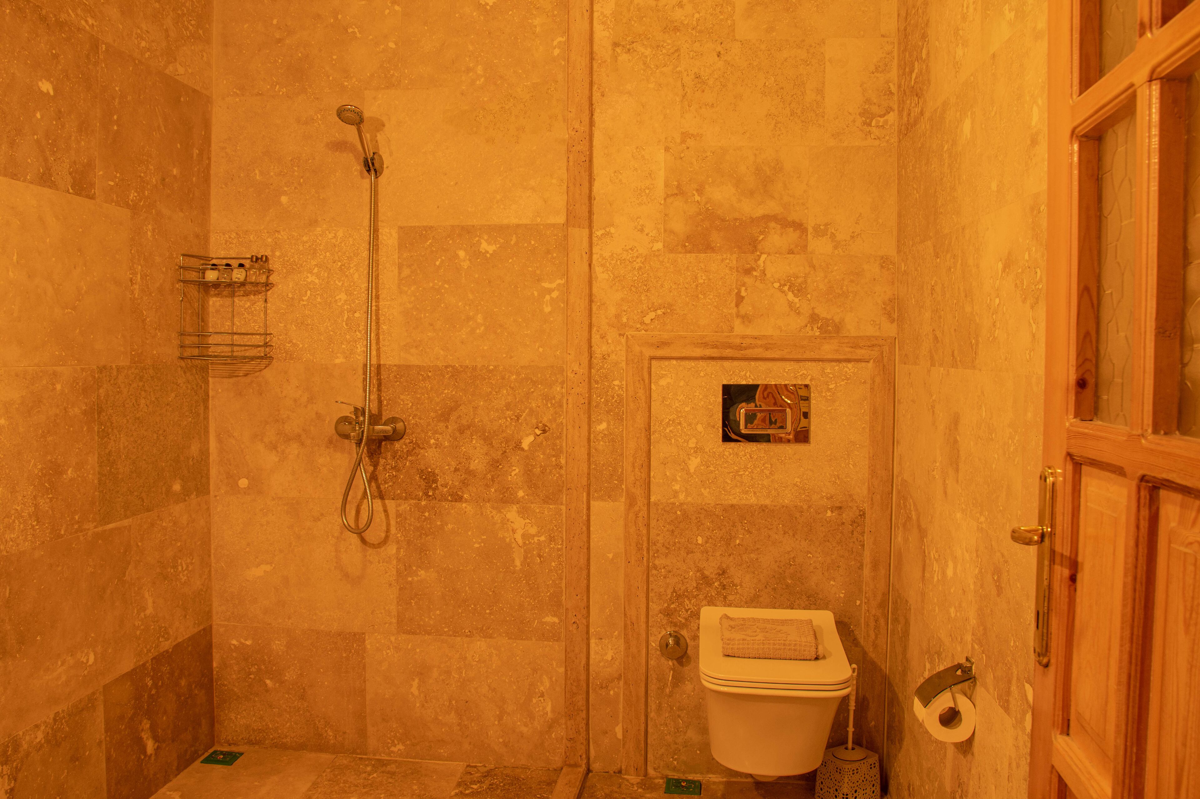 economy double room, 1 queen bed | bathroom | free toiletries, hair dryer, slippers, towels