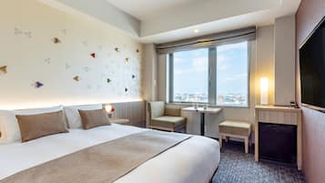 Down comforters, memory foam beds, in-room safe, desk