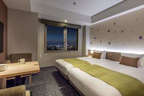Down comforters, memory foam beds, in-room safe, desk