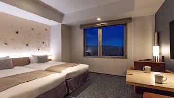 Down duvets, memory-foam beds, in-room safe, desk