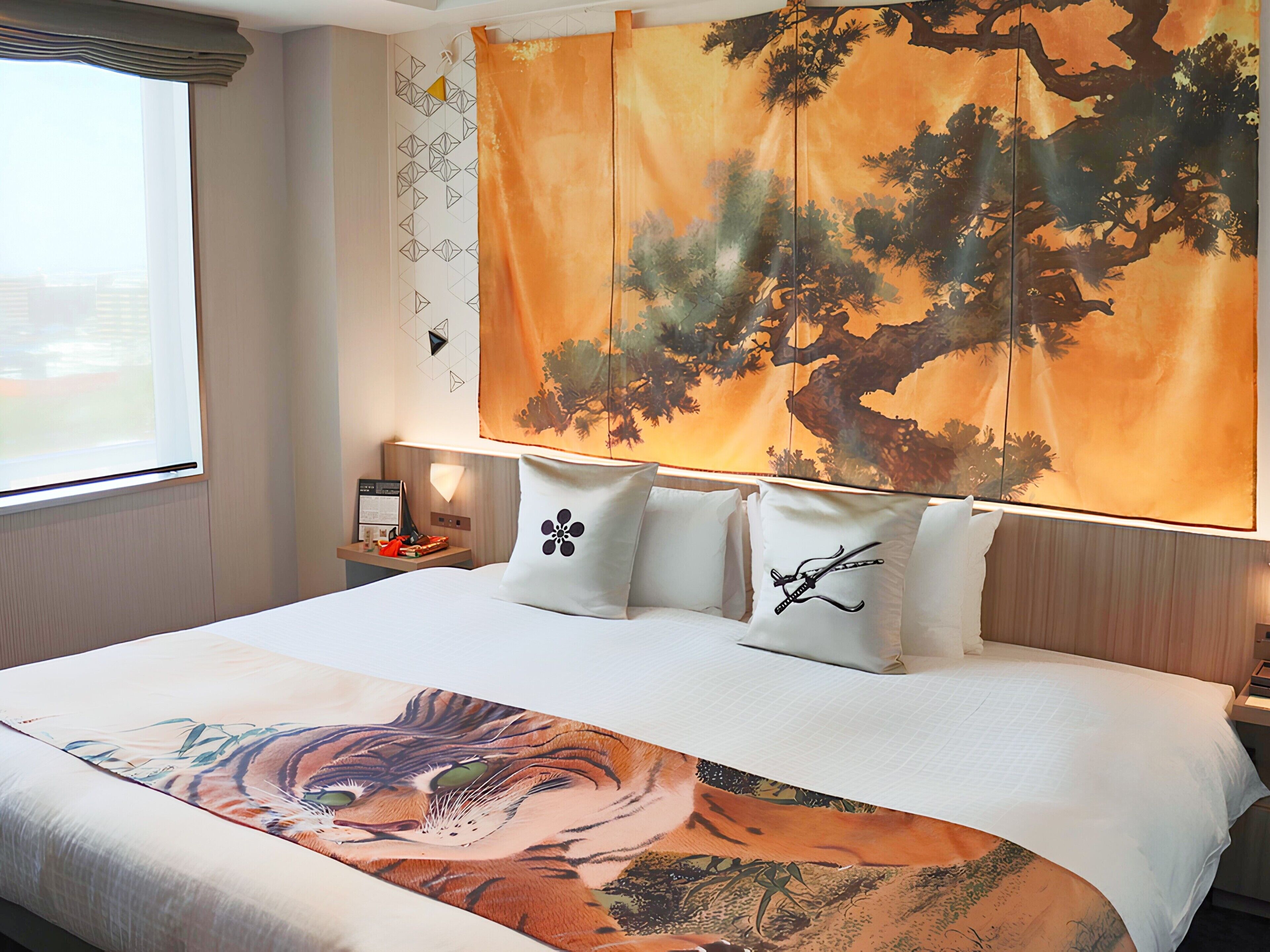 Down duvets, memory-foam beds, in-room safe, desk