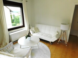 Apartment, 1 Bedroom, Balcony (Angelika) | Living area | LED TV - Ferienapartments Ida (Lorch)