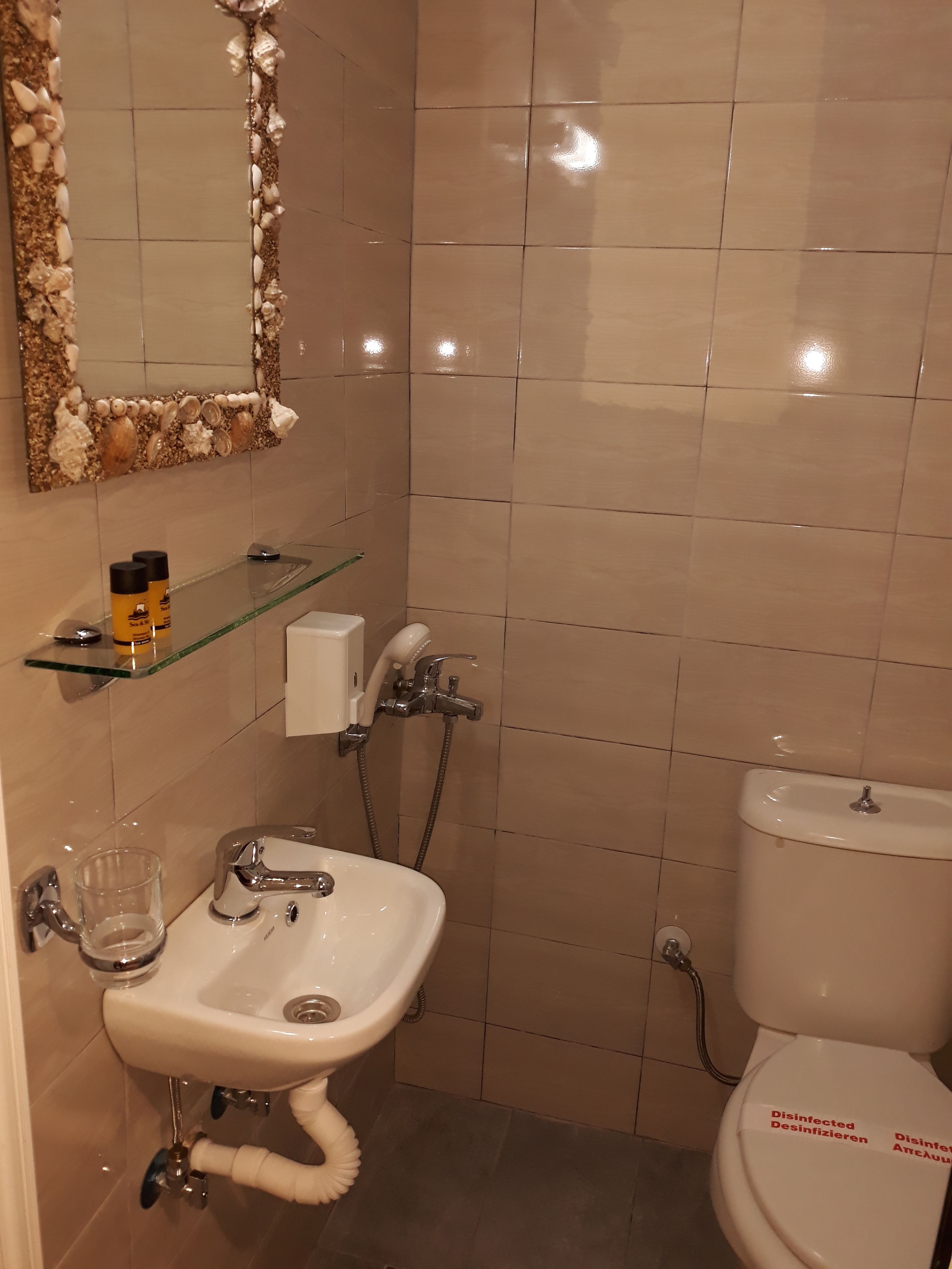 basic room | bathroom | shower, hair dryer, towels, soap