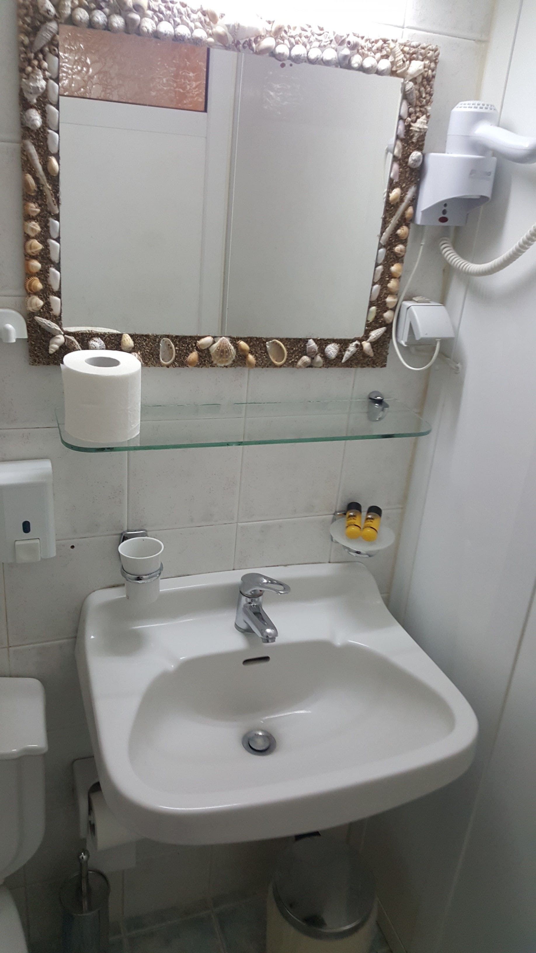 basic room | bathroom | shower, hair dryer, towels, soap