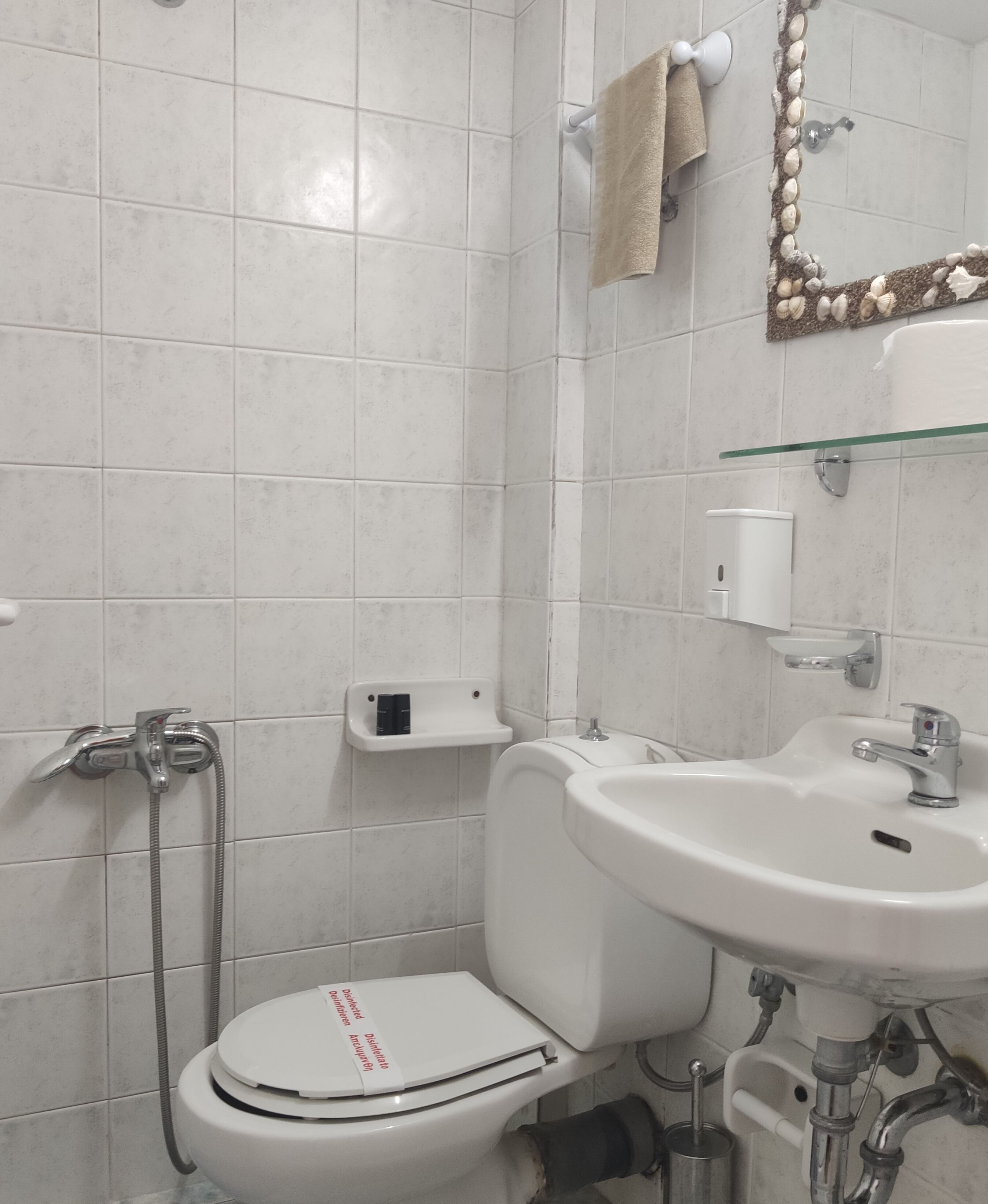 basic room | bathroom | shower, hair dryer, towels, soap