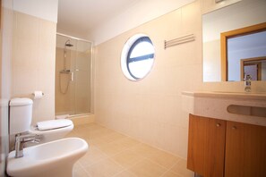 Combined shower/tub, hair dryer