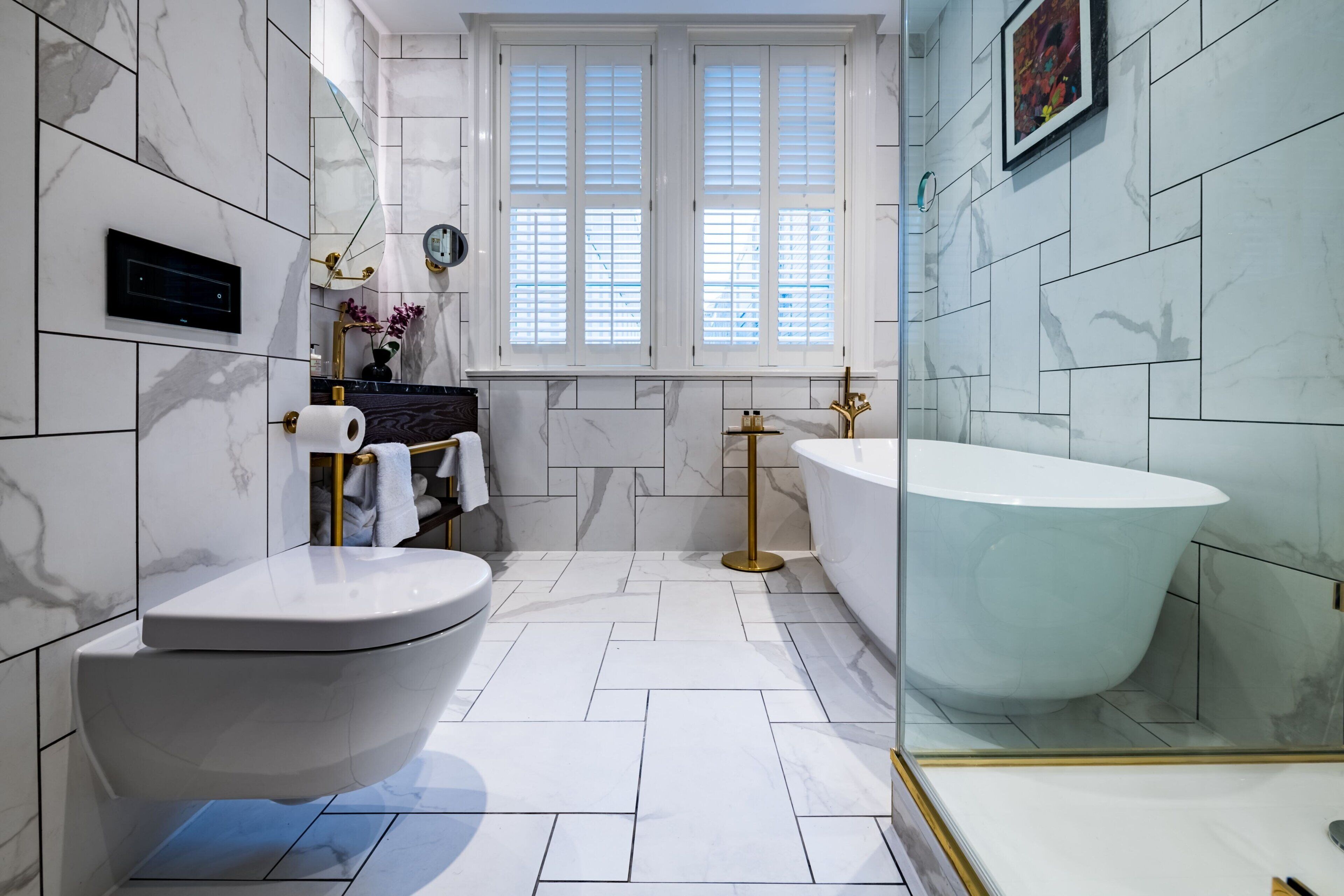 designer toiletries, hair dryer, bathrobes, slippers