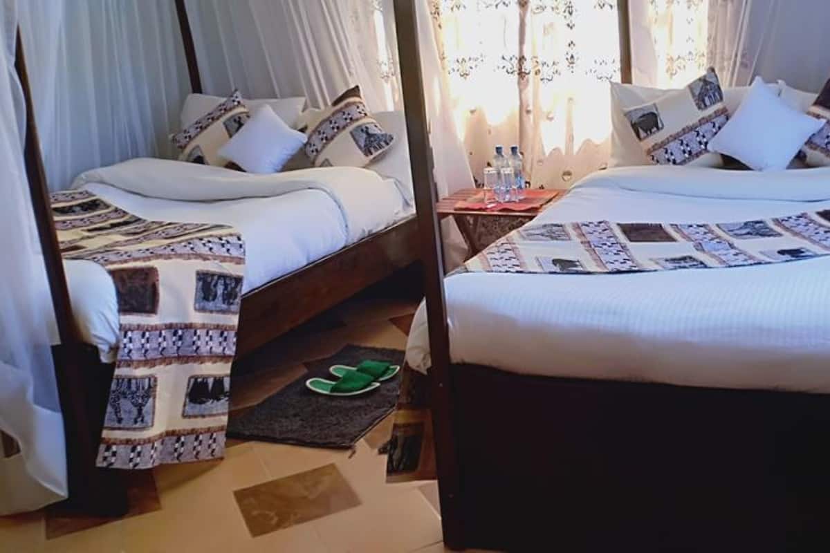 Twin Room | Premium bedding, memory foam beds, desk, iron/ironing board