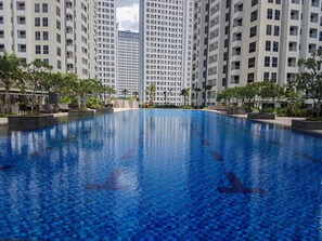 Outdoor pool - 3BR Apartment with Pool View at M-Town Residence (Gading Serpong)