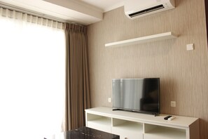Room | Living area | TV - Classic 2BR Apartment At Gateway Pasteur near Exit Toll (Cimahi)