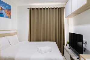Habitació | 1 dormitori, escriptori i roba de llit 