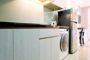 Chambre | Cuisine privée | Réfrigérateur, four à micro-ondes, surface de cuisson