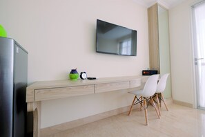 Quarto | Área de estar | TV