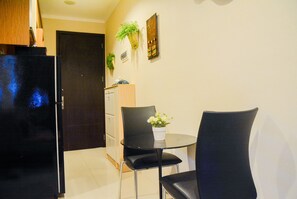 Habitación | Área de sala de estar | Televisión 