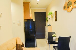 Habitación | Área de sala de estar | Televisión 