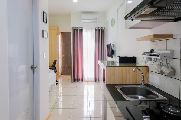 Private kitchenette - Studio Room at M-Town Residence near Summarecon Mall Serpong (Gading Serpong)