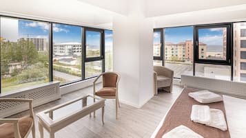 Senior Suite, Balcony, Partial Sea View | 2 bedrooms, individually decorated, individually furnished