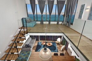 Living area -  YalaRent Migdalor Apartments with Sea Views  (Tiberias)