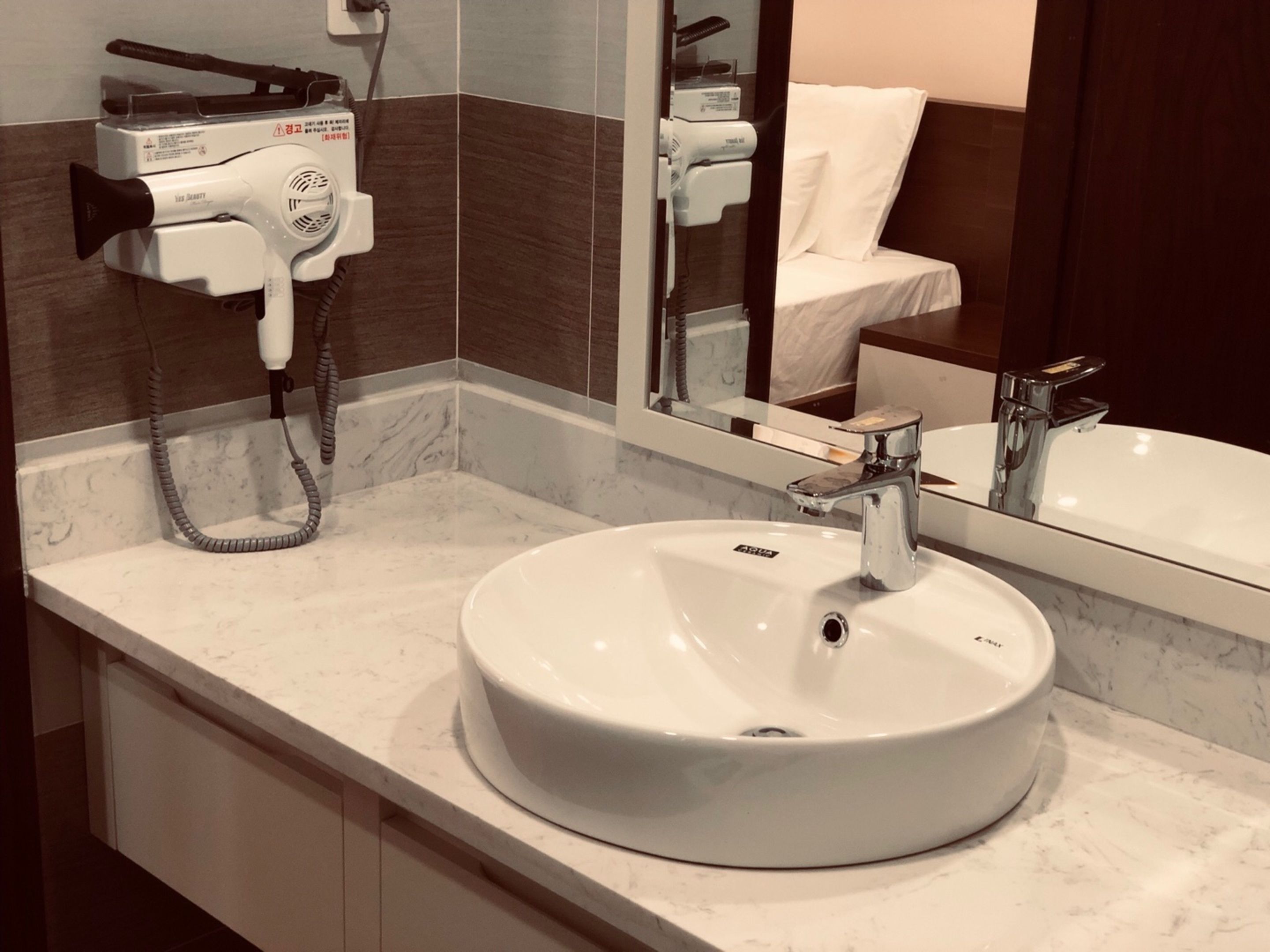 combined shower/bathtub, deep-soaking bathtub, designer toiletries