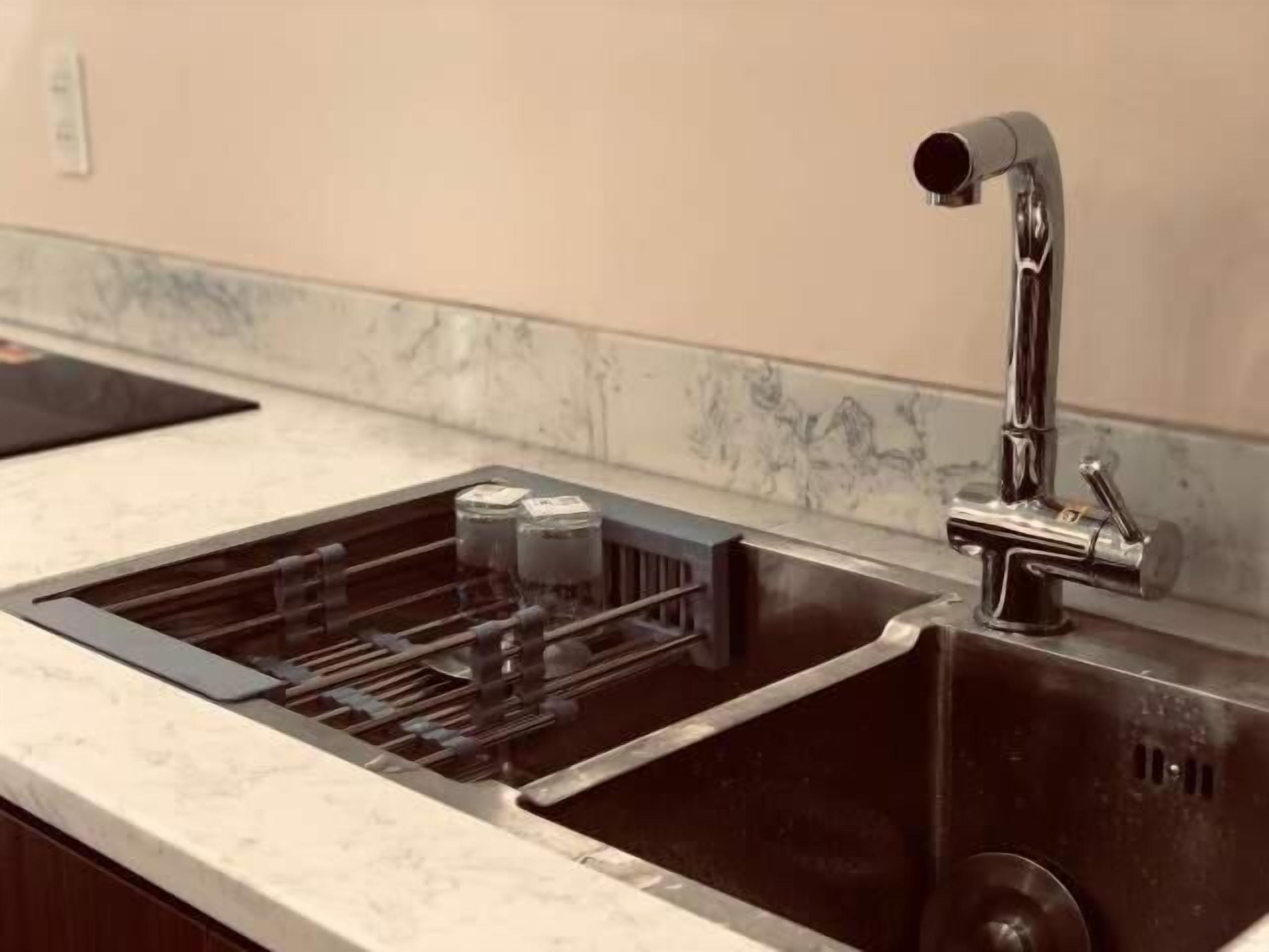 full-sized fridge, microwave, stovetop, electric kettle