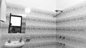 Designer toiletries, hair dryer, bathrobes, slippers