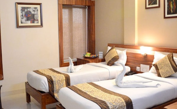 In-room safe, desk, laptop workspace, rollaway beds