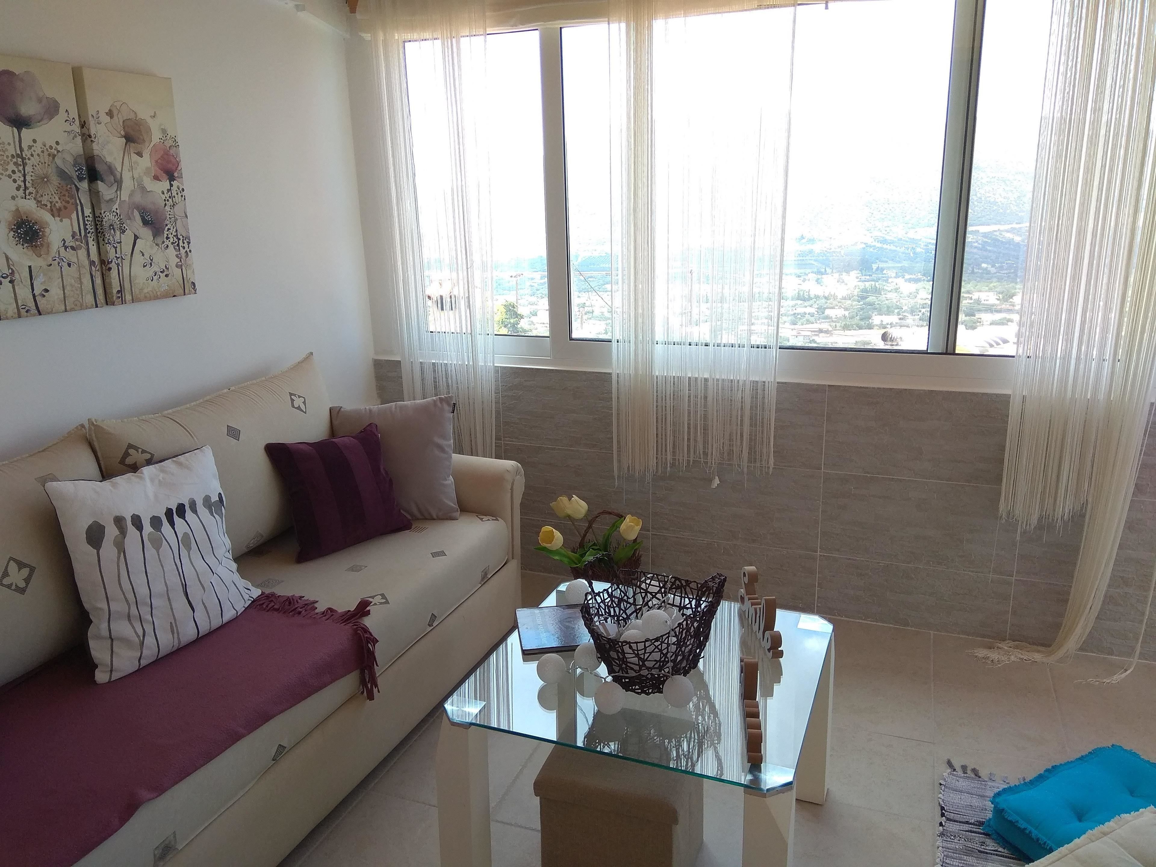Panoramic Apartment | Living room | Flat-screen TV