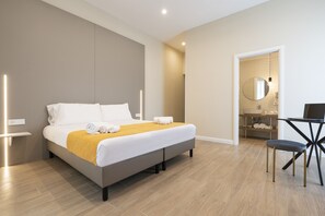 Deluxe-Doppel- oder -Zweibettzimmer | Italienische Bettbezüge von Frette, hochwertige Bettwaren