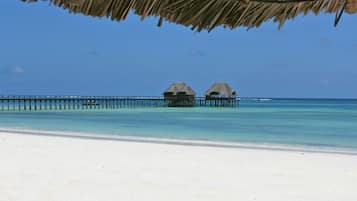 Private beach, white sand, sun-loungers, beach umbrellas