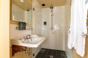 Shower, rainfall showerhead, eco-friendly toiletries, hair dryer