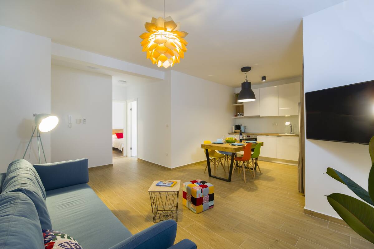 Deluxe Apartment, Pool View, Ground Floor | Living area | 125-cm Smart TV with satellite channels, TV, Netflix
