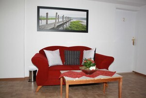 32-inch flat-screen TV with satellite channels, TV