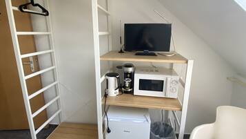 Eenvoudige eenpersoonskamer, gedeelde badkamer | Dineren in de kamer