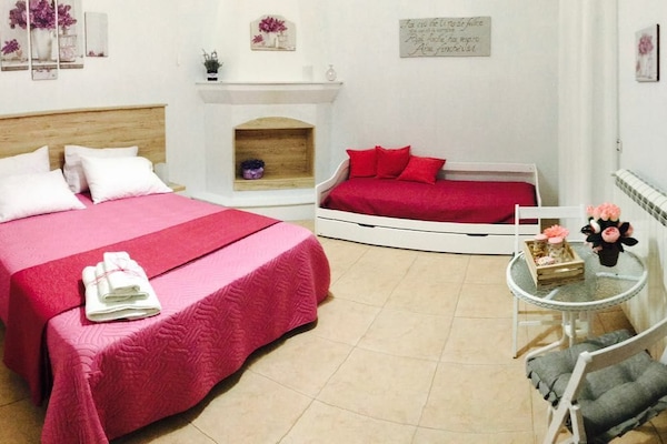 Basic Quadruple Room, Shared Bathroom | Iron/ironing board, cribs/infant beds, free WiFi, bed sheets
