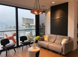 Panoramic Condo | Living area | LCD TV - Energy Living by Velvet Luxury (Medellín)